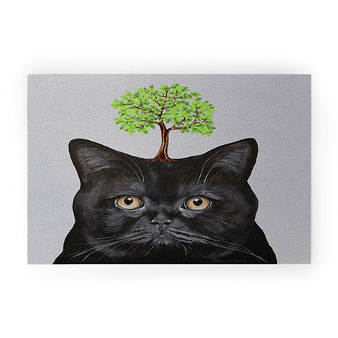 Coco de Paris A black cat with a tree Welcome Mat
