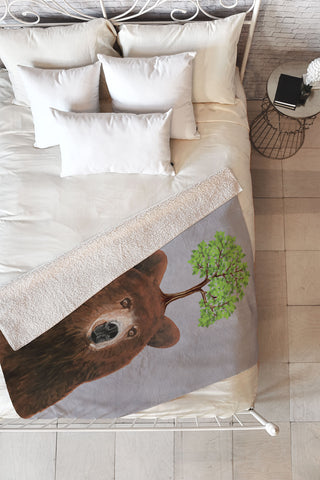 Coco de Paris A brown bear with a tree Fleece Throw Blanket