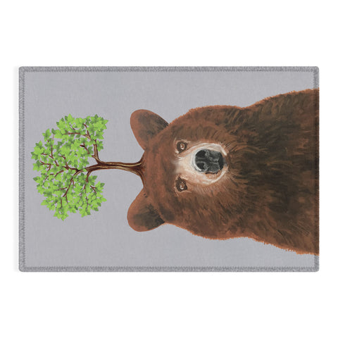Coco de Paris A brown bear with a tree Outdoor Rug