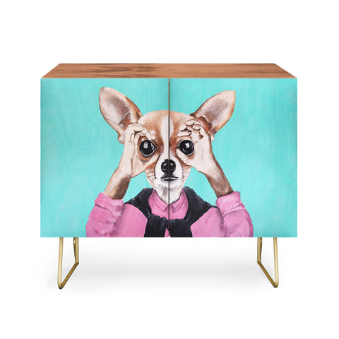 Coco de Paris Chihuahua is looking Credenza