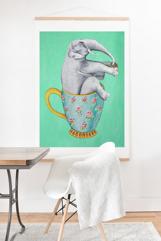 Coco de Paris Elephant in a cup turquoise background Art Print And Hanger