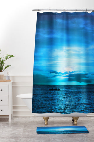 Deb Haugen paddling on Shower Curtain And Mat