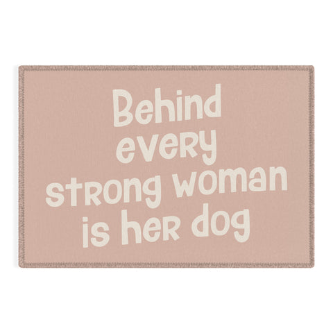 DirtyAngelFace Behind Every Strong Woman is Her Dog Outdoor Rug