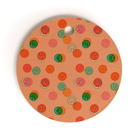 Doodle By Meg Smiley Face Print in Orange Cutting Board Round
