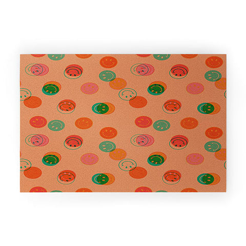 Doodle By Meg Smiley Face Print in Orange Welcome Mat