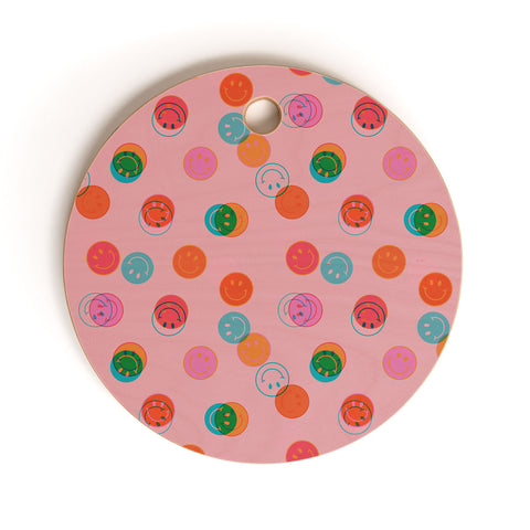 Doodle By Meg Smiley Face Print in Pink Cutting Board Round