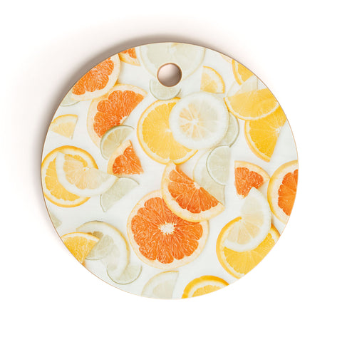 Ingrid Beddoes citrus orange twist Cutting Board Round