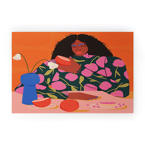 isabelahumphrey Still Life of a Woman with Dessert and Fruit Welcome Mat