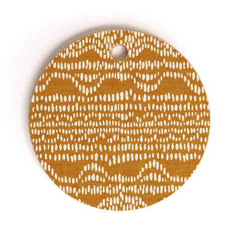 Iveta Abolina Dripping Dots Caramel Cutting Board Round