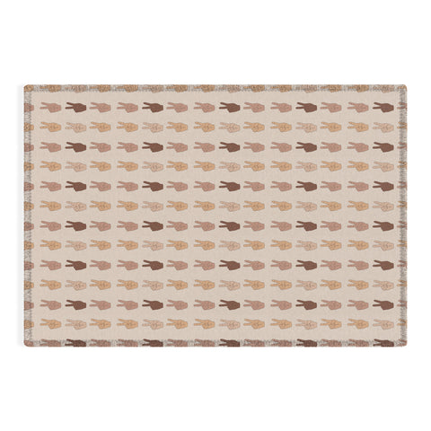 Iveta Abolina Peace Hands Tan Outdoor Rug