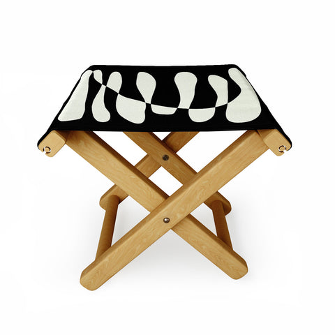 June Journal Abstract Composition in Black Folding Stool