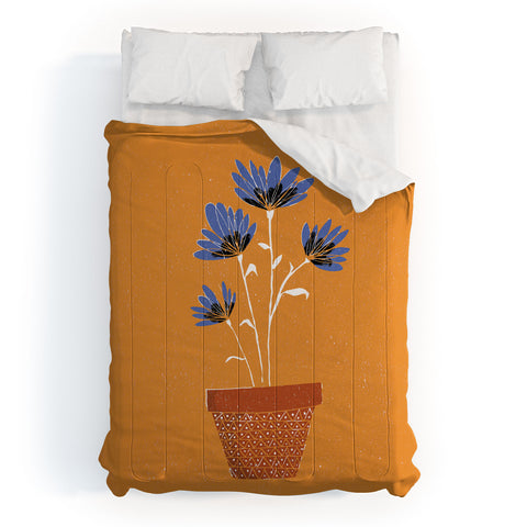 justin shiels blue flowers on orange background Comforter