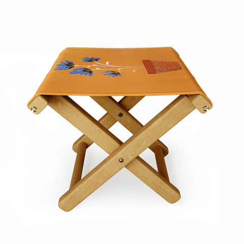 justin shiels blue flowers on orange background Folding Stool