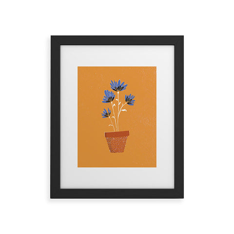 justin shiels blue flowers on orange background Framed Art Print