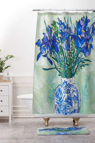 Lara Lee Meintjes Iris Bouquet in Chinoiserie Vase on Blue and White Striped Tablecloth on Painterly Mint Green Shower Curtain And Mat