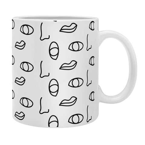 Laura Redburn seeing faces Coffee Mug