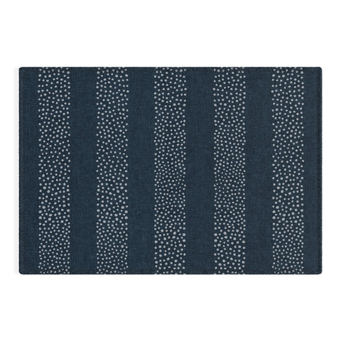 Little Arrow Design Co angrand stipple stripes navy Outdoor Rug