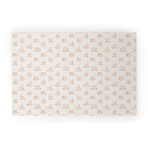 Little Arrow Design Co aria orange line faces Welcome Mat