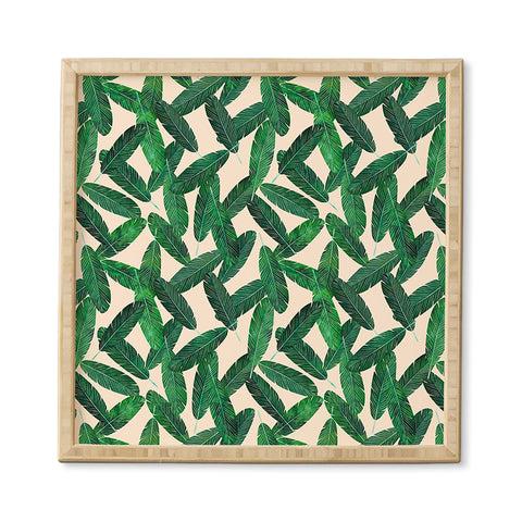 Little Arrow Design Co banana leaves on blush Framed Wall Art