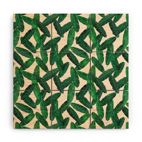 Little Arrow Design Co banana leaves on blush Wood Wall Mural