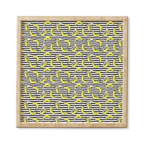 Little Arrow Design Co Bananas on Stripes Framed Wall Art