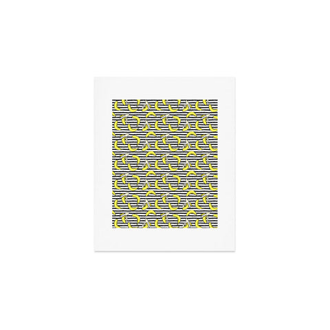 Little Arrow Design Co Bananas on Stripes Art Print