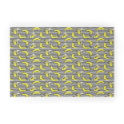 Little Arrow Design Co Bananas on Stripes Welcome Mat