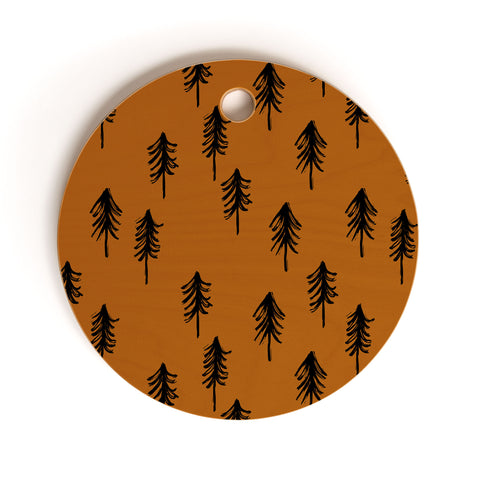 Little Arrow Design Co black trees on dark maple Cutting Board Round