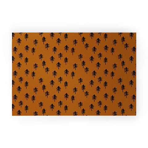 Little Arrow Design Co black trees on dark maple Welcome Mat