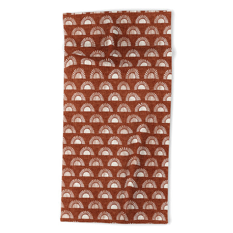 Little Arrow Design Co block print suns on rust Beach Towel