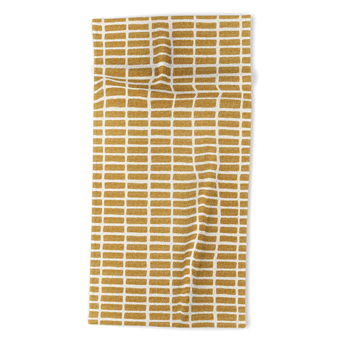 Little Arrow Design Co block print tile mustard Beach Towel