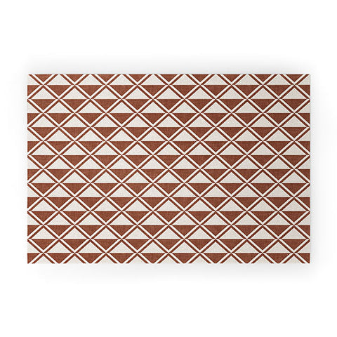 Little Arrow Design Co bodhi geo diamonds rust Welcome Mat