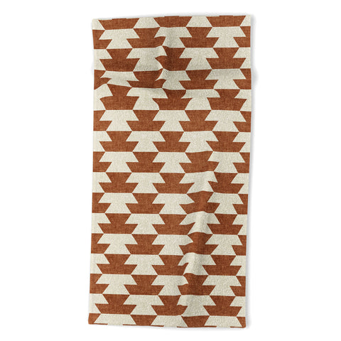 Little Arrow Design Co boho geometric aztec in ginger Beach Towel