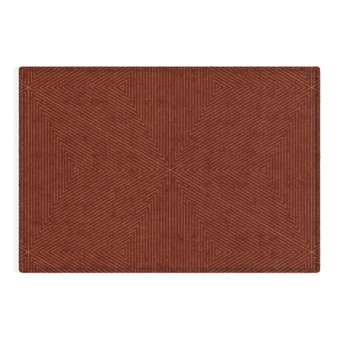 Little Arrow Design Co boho triangle stripes rust Outdoor Rug
