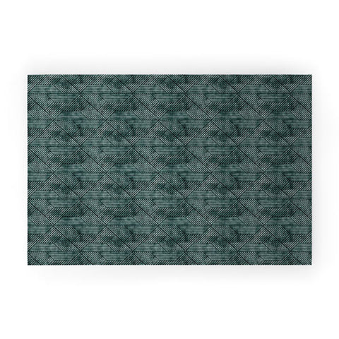 Little Arrow Design Co cadence triangles dark green Welcome Mat