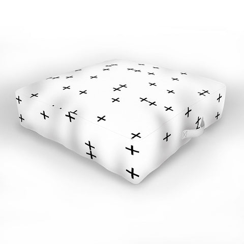 Little Arrow Design Co Cross on White Outdoor Floor Cushion