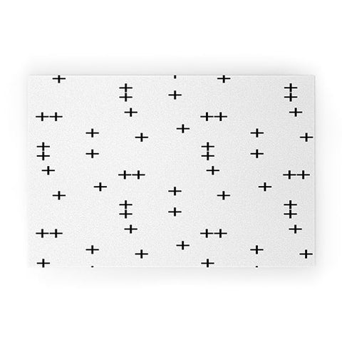 Little Arrow Design Co Cross on White Welcome Mat