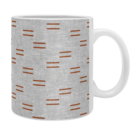 Little Arrow Design Co double dash rust on greige Coffee Mug