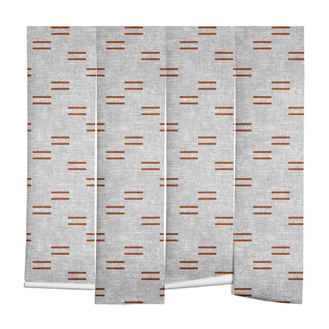 Little Arrow Design Co double dash rust on greige Wall Mural