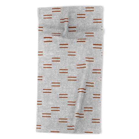 Little Arrow Design Co double dash rust on greige Beach Towel