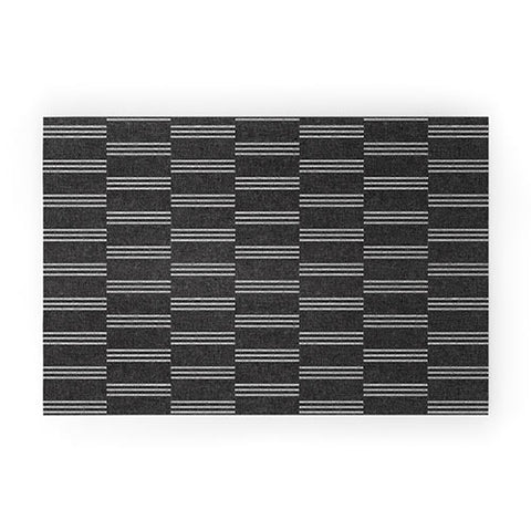 Little Arrow Design Co ella triple stripe charcoal Welcome Mat