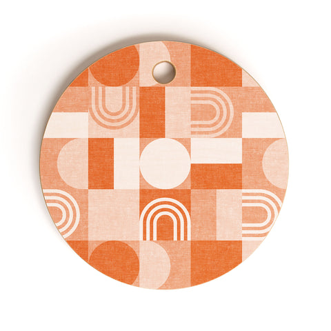 Little Arrow Design Co geometric patchwork orange Cutting Board Round
