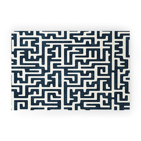 Little Arrow Design Co maze in dark blue Welcome Mat