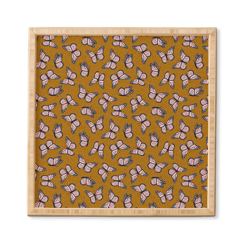 Little Arrow Design Co monarch butterflies pink Framed Wall Art