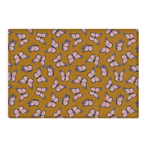 Little Arrow Design Co monarch butterflies pink Outdoor Rug