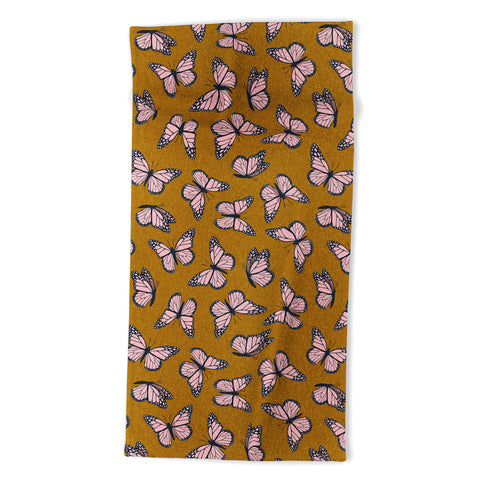 Little Arrow Design Co monarch butterflies pink Beach Towel