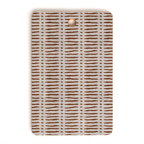 Little Arrow Design Co mud cloth dash rust Cutting Board Rectangle