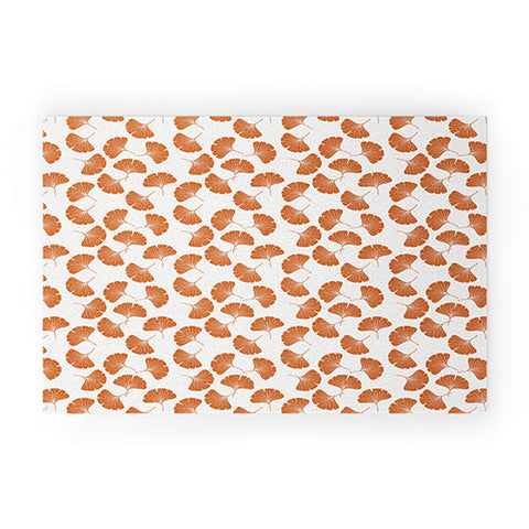 Little Arrow Design Co orange ginkgo leaves Welcome Mat