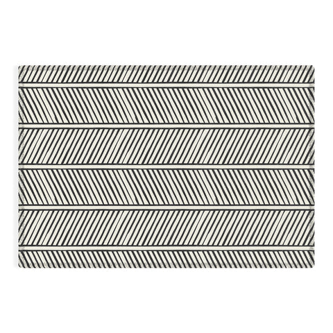 Little Arrow Design Co Organic Chevron Inkwell Outdoor Rug