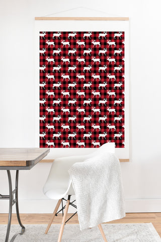 Little Arrow Design Co reindeer on buffalo plaid Art Print And Hanger